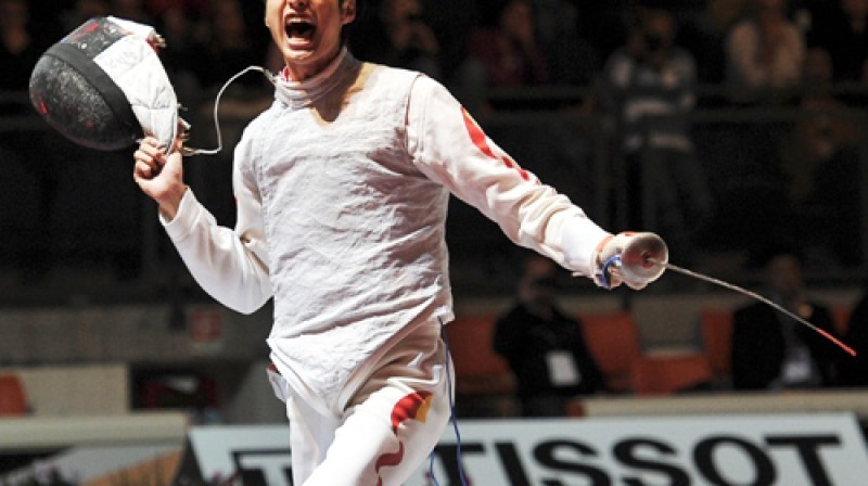 Lī Šengs(Ķīna) svin uzvaru finālā pār Franciju.
Foto: AP/Scanpix