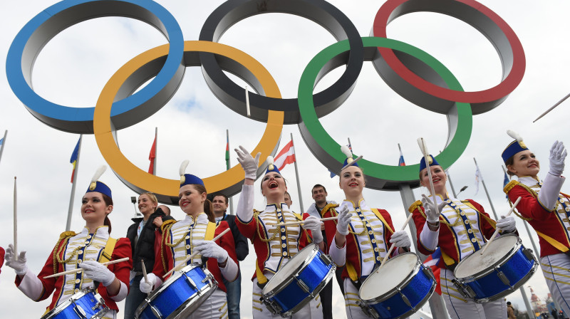 Priekšnesums zem olimpiskajiem apļiem 
Foto: AFP / Scanpix