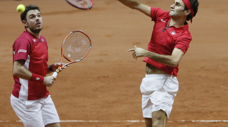 Stans Vavrinka un Rodžers Federers
Foto: Reuters/Scanpix