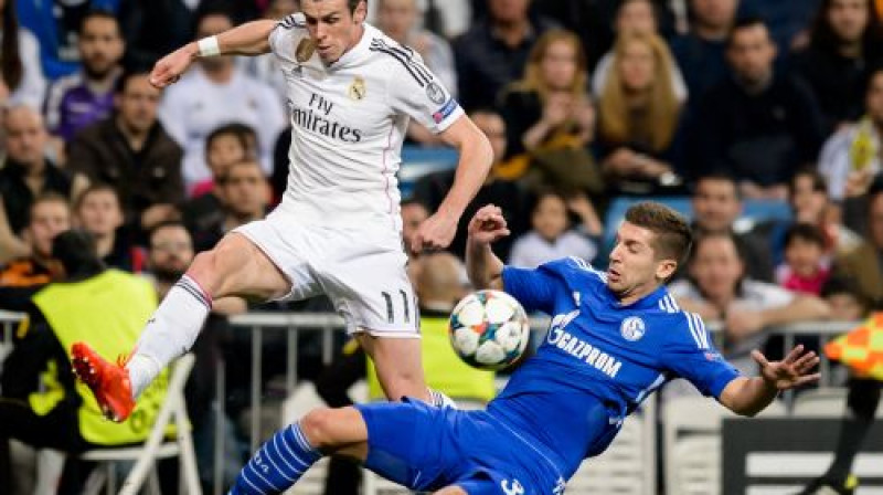 Matija Nastasičs (pa labi) Geretam Beilam vakaru Madridē sabojāja pamatīgi
Foto: AFP/Scanpix