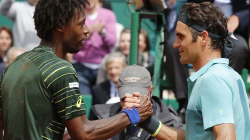 Gaels Monfīss un Rodžers Federers
Foto: Reuters/Scanpix