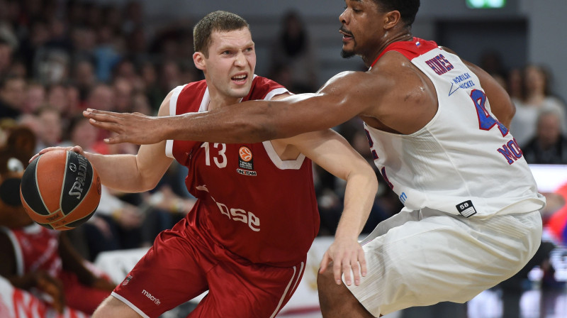 Jānis Strēlnieks pret Kailu Hainsu
Foto: AFP/Scanpix