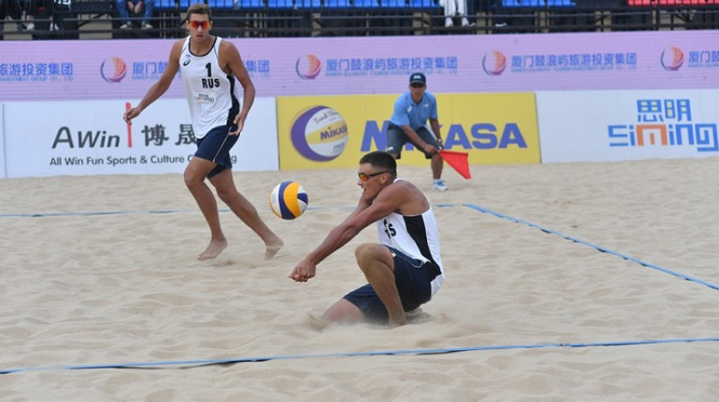 Oļegs Stojanovskis (#1) un Igors Veļičko (#2)
Foto: FIVB